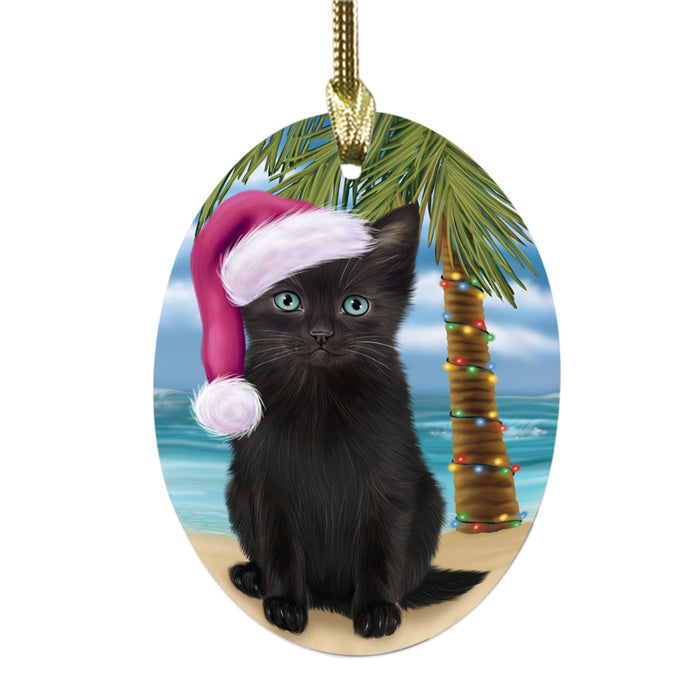 Summertime Happy Holidays Christmas Black Cat on Tropical Island Beach Oval Glass Christmas Ornament OGOR49354
