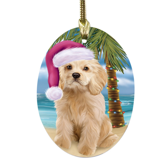 Summertime Happy Holidays Christmas Cocker Spaniel Dog on Tropical Island Beach Oval Glass Christmas Ornament OGOR49365