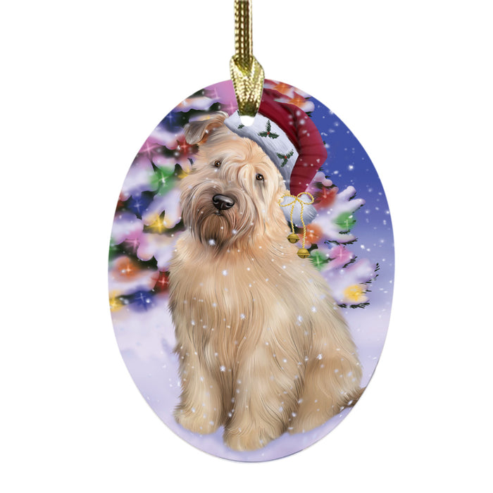Winterland Wonderland Wheaten Terrier Dog In Christmas Holiday Scenic Background Oval Glass Christmas Ornament OGOR49657