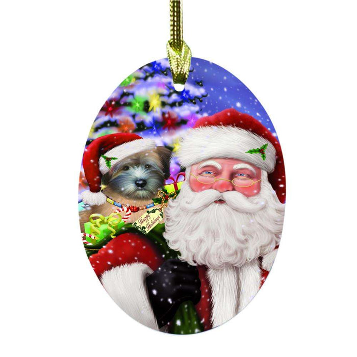Jolly Old Saint Nick Santa Holding Wheaten Terrier Dog and Happy Holiday Gifts Oval Glass Christmas Ornament OGOR48896