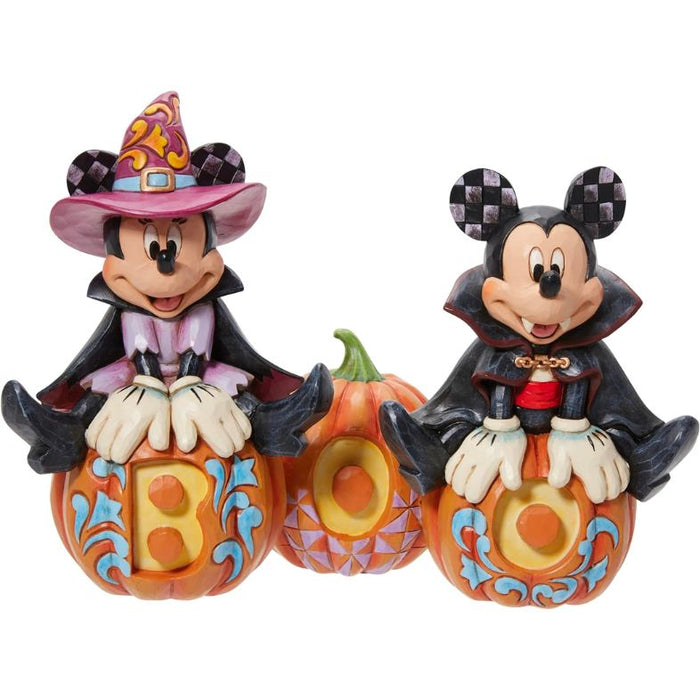 Enesco Jim Shore Disney Traditions Mickey and Minnie Mouse Jumping Over Carved Pumpkins