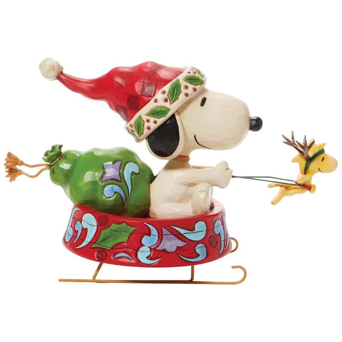 Enesco Jim Shore Santa Snoopy in a Dog Bowl Sled Figurine, 5.5"