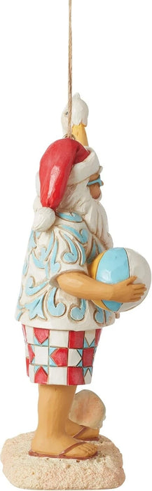 Jim Shore Heartwood Creek Coastal Santa with Beach Signs and Pelican Ornament