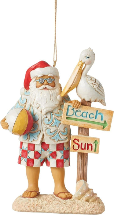 Jim Shore Heartwood Creek Coastal Santa with Beach Signs and Pelican Ornament