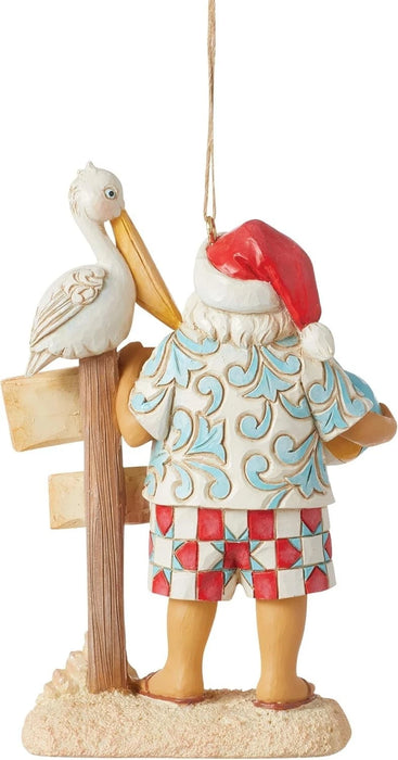 Jim Shore Heartwood Creek Coastal Santa with Beach Signs and Pelican Ornament
