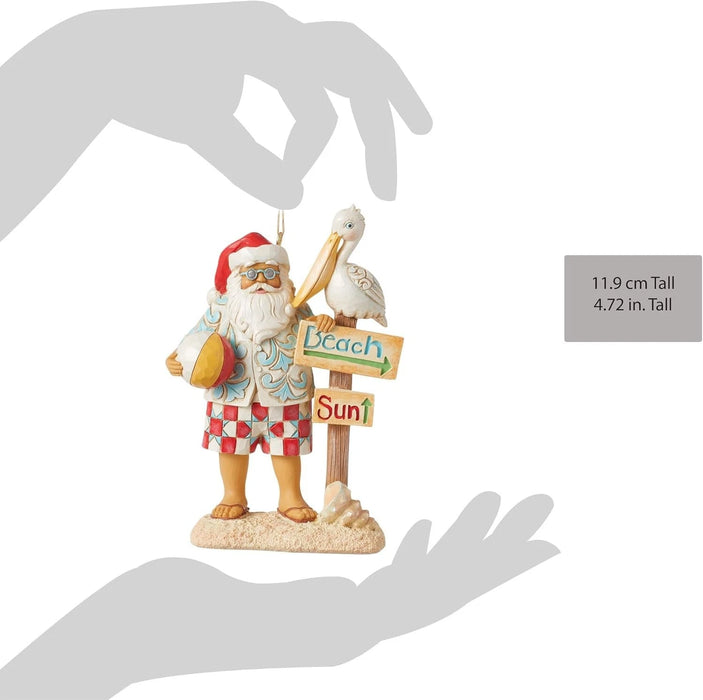 Jim Shore Heartwood Creek Coastal Santa with Beach Signs and Pelican Ornament