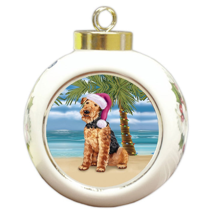 Summertime Happy Holidays Christmas Airedale Dog on Tropical Island Beach Round Ball Ornament