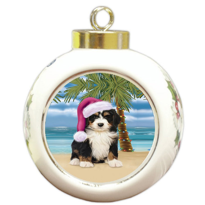 Summertime Happy Holidays Christmas Bernedoodle Dog on Tropical Island Beach Round Ball Ornament