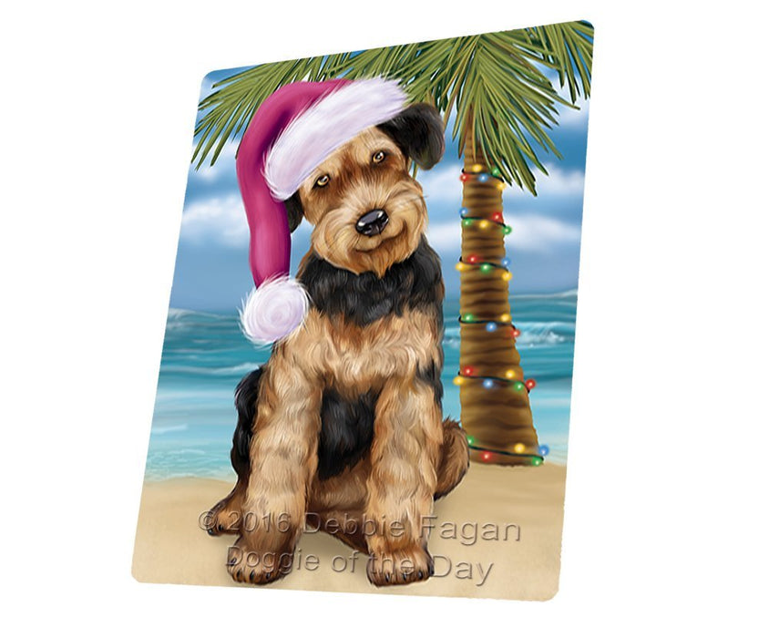 Summertime Happy Holidays Christmas Airedale Dog on Tropical Island Beach Tempered Cutting Board