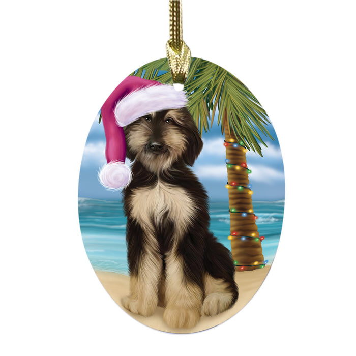 Summertime Happy Holidays Christmas Afghan Hound Dog on Tropical Island Beach Oval Glass Christmas Ornament OGOR49334