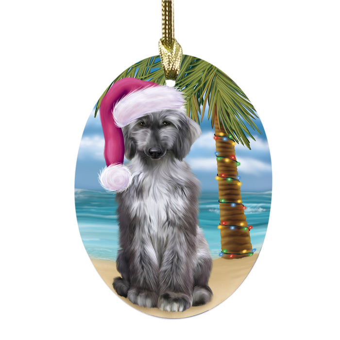 Summertime Happy Holidays Christmas Afghan Hound Dog on Tropical Island Beach Oval Glass Christmas Ornament OGOR49336