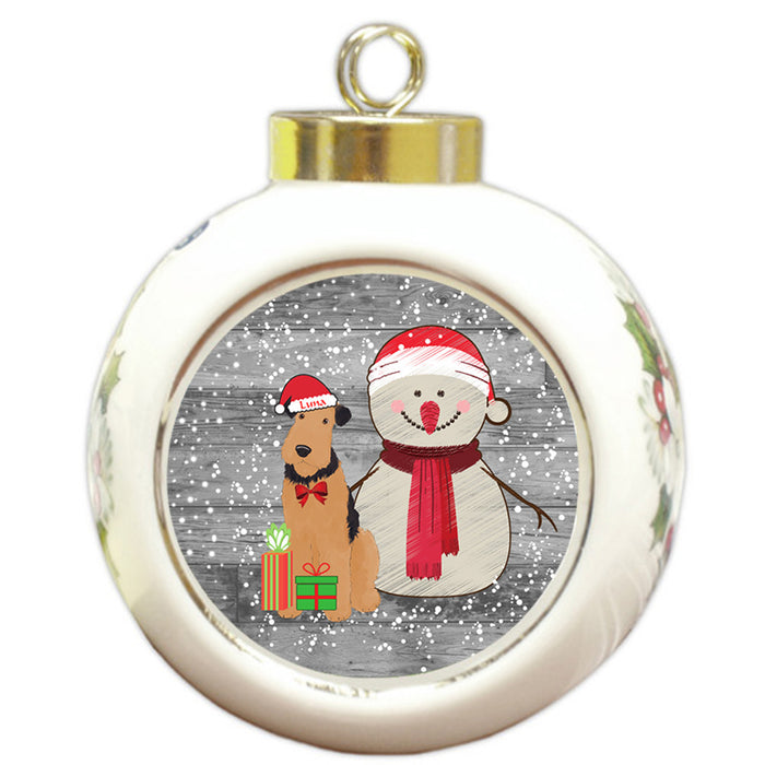 Custom Personalized Snowy Snowman and Airedale Terrier Dog Christmas Round Ball Ornament