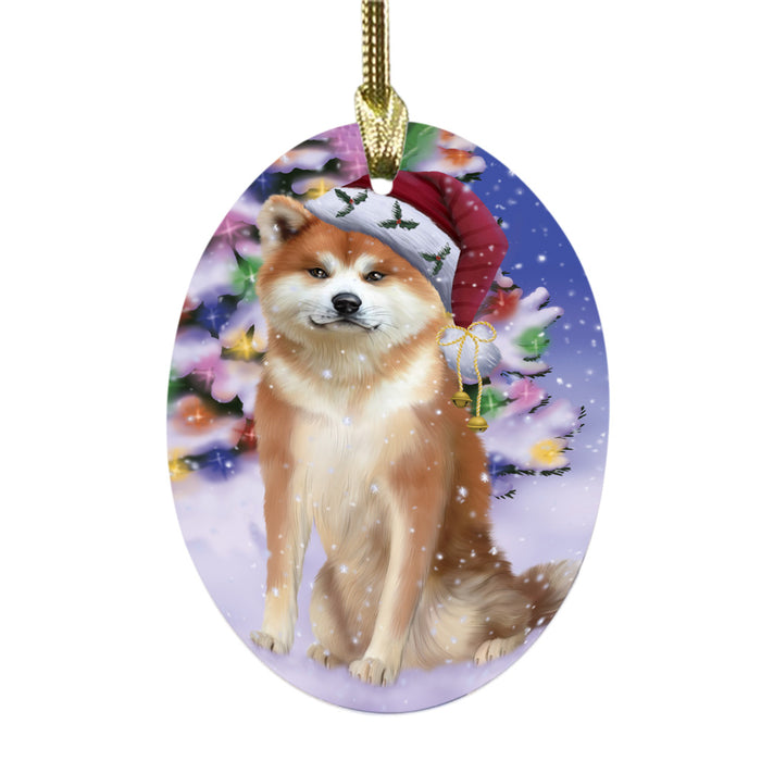 Winterland Wonderland Akita Dog In Christmas Holiday Scenic Background Oval Glass Christmas Ornament OGOR49482