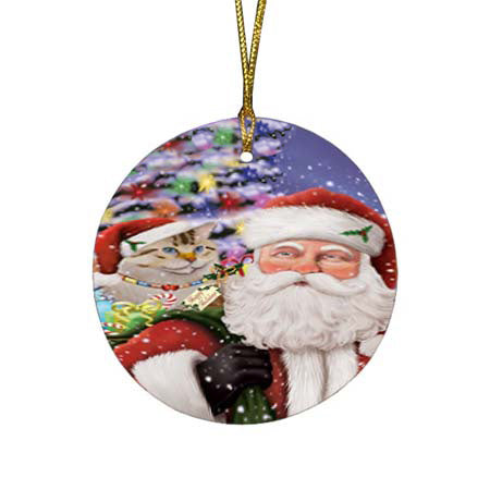 Santa Carrying American Bobtail Cat and Christmas Presents Round Flat Christmas Ornament RFPOR55833