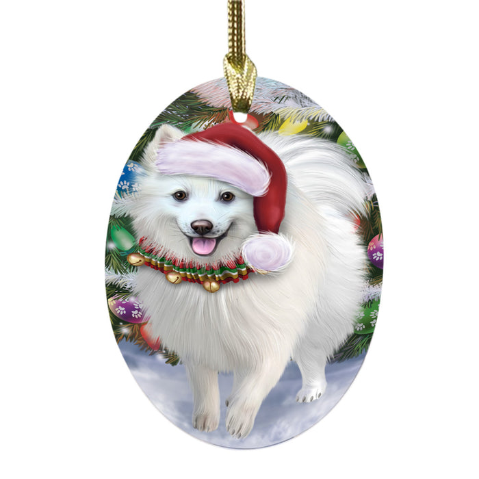 Trotting in the Snow American Eskimo Dog Oval Glass Christmas Ornament OGOR49422