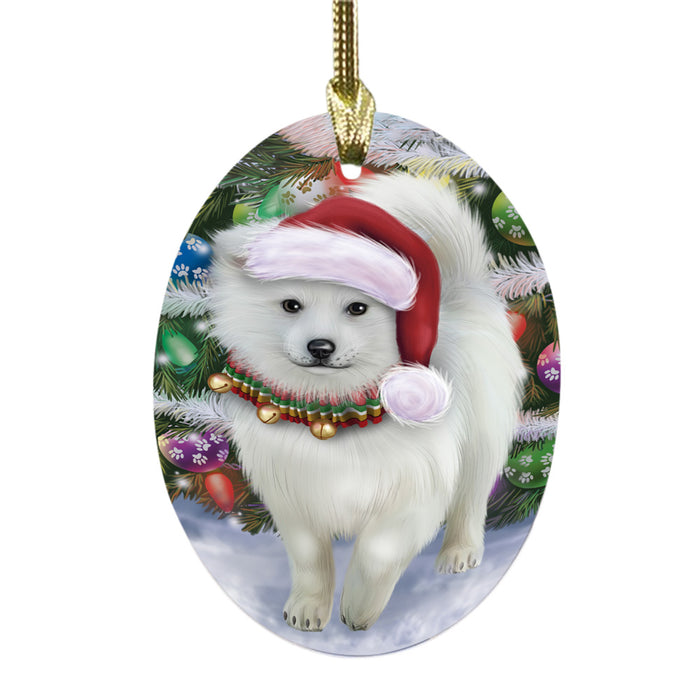 Trotting in the Snow American Eskimo Dog Oval Glass Christmas Ornament OGOR49423