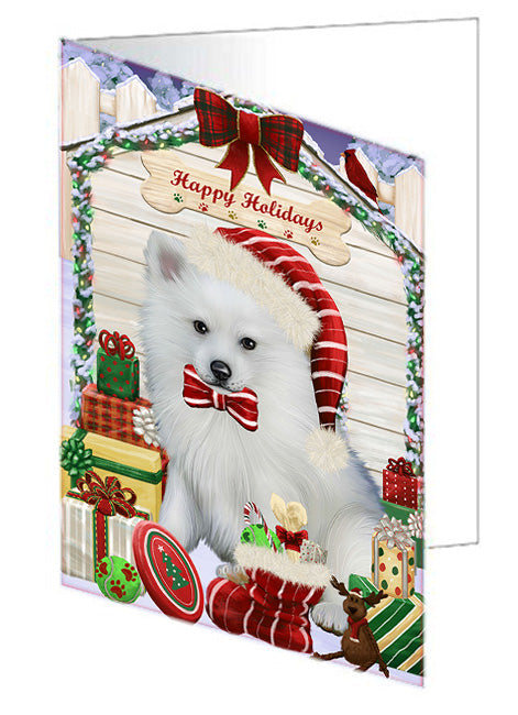 Happy Holidays Christmas American Eskimo Dog House with Presents Handmade Artwork Assorted Pets Greeting Cards and Note Cards with Envelopes for All Occasions and Holiday Seasons GCD57947