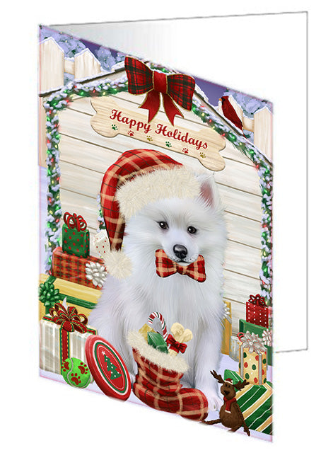 Happy Holidays Christmas American Eskimo Dog House with Presents Handmade Artwork Assorted Pets Greeting Cards and Note Cards with Envelopes for All Occasions and Holiday Seasons GCD57950