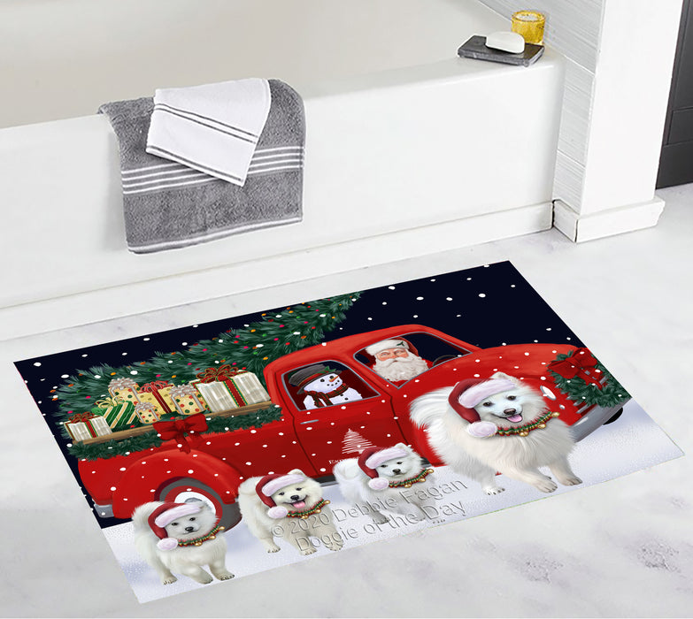 Christmas Express Delivery Red Truck Running American Eskimo Dogs Bath Mat BRUG53413
