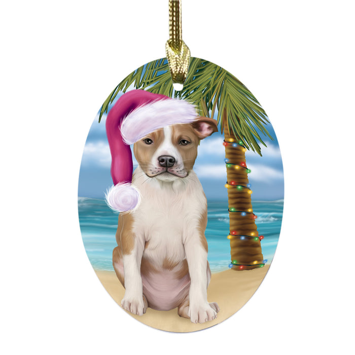 Summertime Happy Holidays Christmas American Staffordshire Dog on Tropical Island Beach Oval Glass Christmas Ornament OGOR49341
