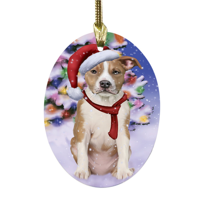 Winterland Wonderland American Staffordshire Dog In Christmas Holiday Scenic Background Oval Glass Christmas Ornament OGOR49490