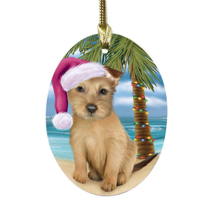 Summertime Happy Holidays Christmas Australian Terrier Dog on Tropical Island Beach Oval Glass Christmas Ornament OGOR49345