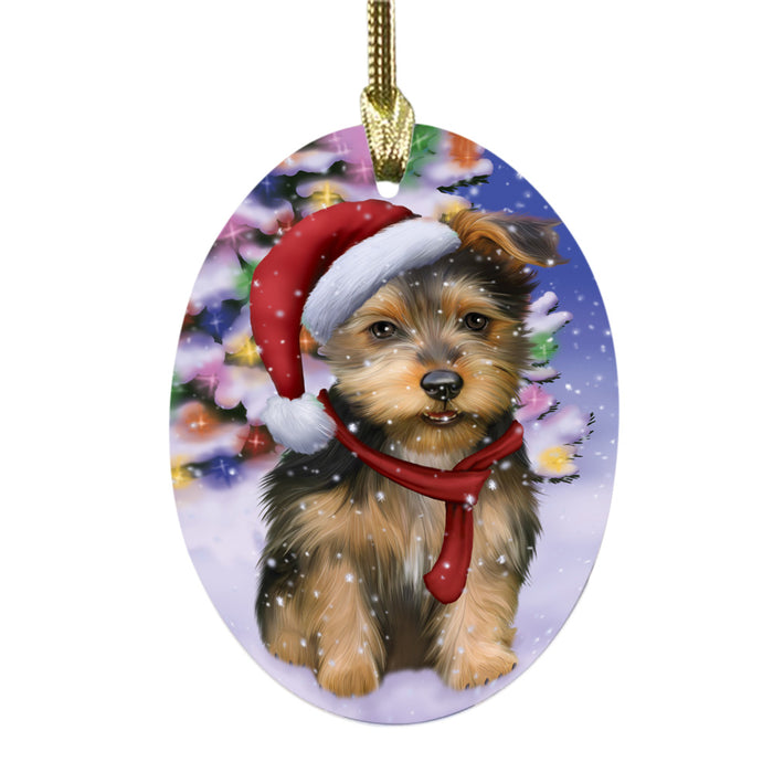 Winterland Wonderland Australian Terrier Dog In Christmas Holiday Scenic Background Oval Glass Christmas Ornament OGOR49507