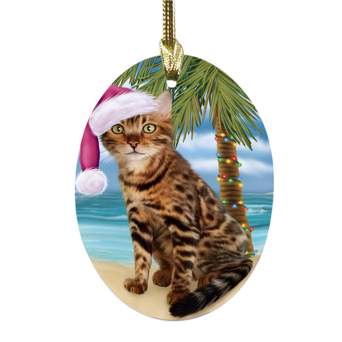 Summertime Happy Holidays Christmas Bengal Cat on Tropical Island Beach Oval Glass Christmas Ornament OGOR49347