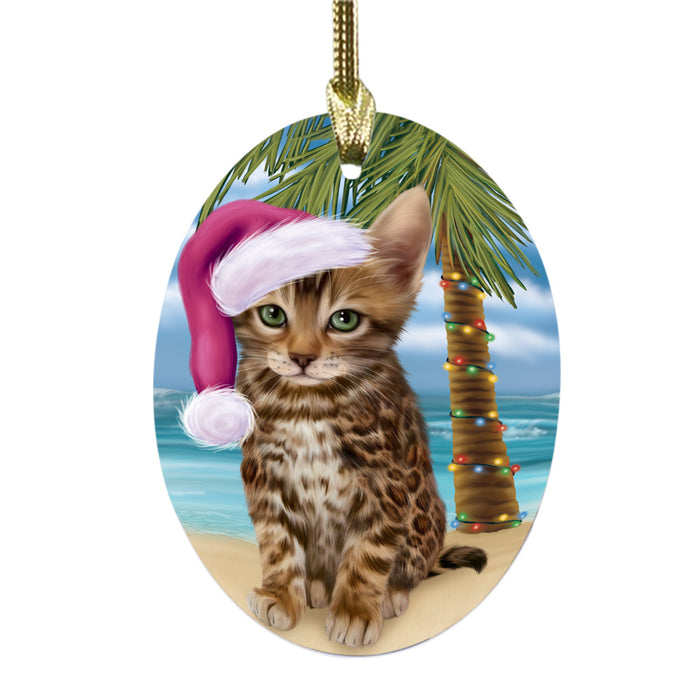 Summertime Happy Holidays Christmas Bengal Cat on Tropical Island Beach Oval Glass Christmas Ornament OGOR49348