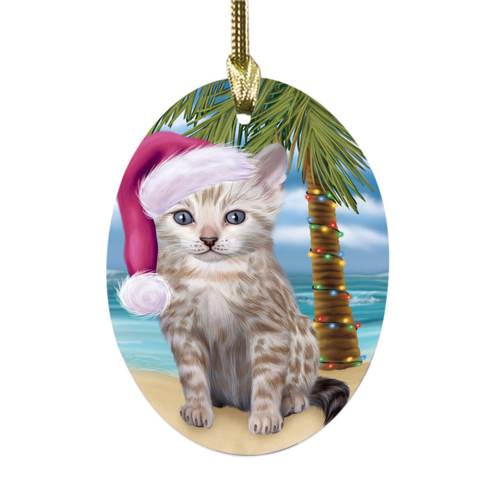 Summertime Happy Holidays Christmas Bengal Cat on Tropical Island Beach Oval Glass Christmas Ornament OGOR49350