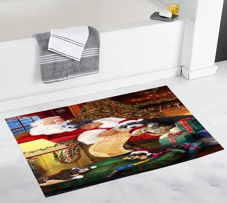 Santa Sleeping with Bernedoodlle Dogs Bath Mat