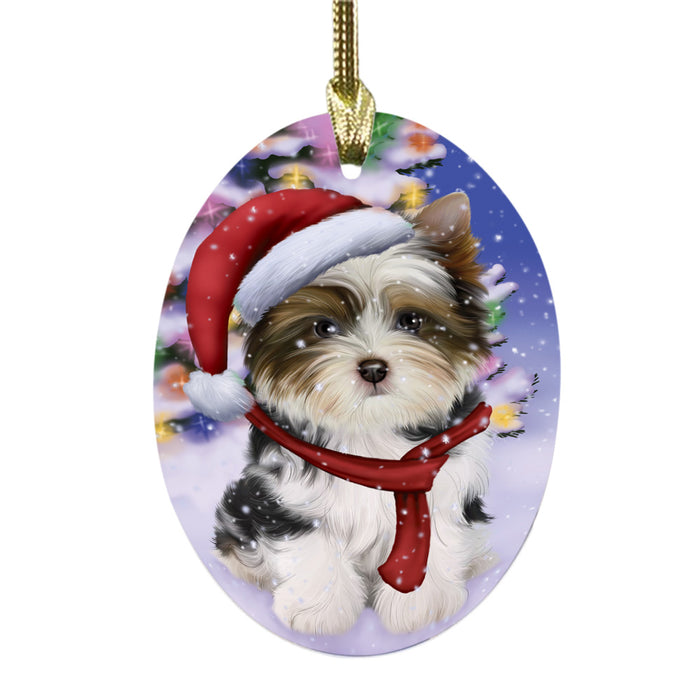 Winterland Wonderland Biewer Dog In Christmas Holiday Scenic Background Oval Glass Christmas Ornament OGOR49523