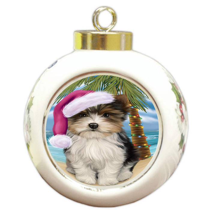 Summertime Happy Holidays Christmas Biewer Terrier Dog on Tropical Island Beach Round Ball Christmas Ornament RBPOR54539
