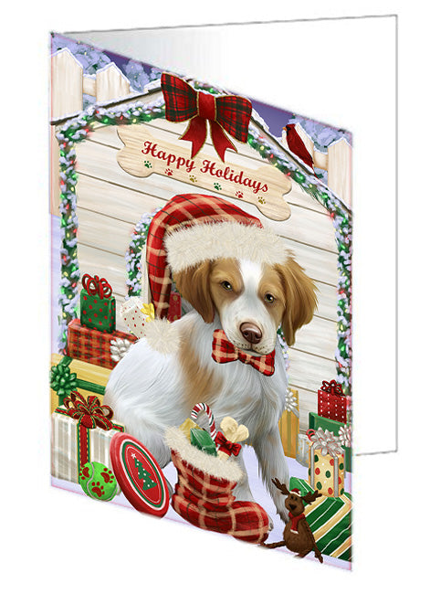 Happy Holidays Christmas Brittany Spaniel Dog House with Presents Handmade Artwork Assorted Pets Greeting Cards and Note Cards with Envelopes for All Occasions and Holiday Seasons GCD58115