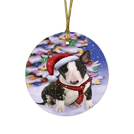 Winterland Wonderland Bull Terrier Dog In Christmas Holiday Scenic Background  Round Flat Christmas Ornament RFPOR53360