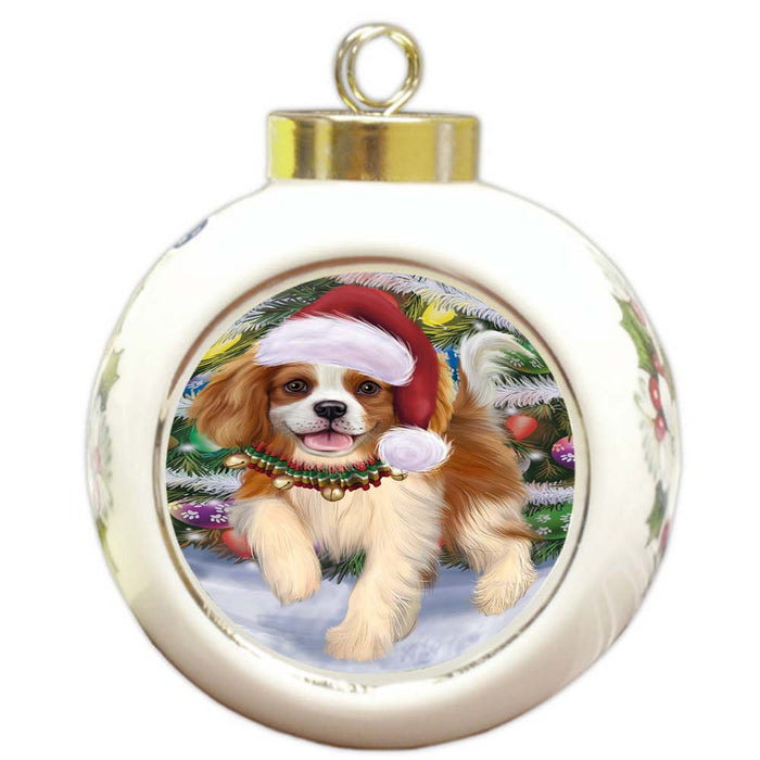 Trotting in the Snow Cavalier King Charles Spaniel Dog Round Ball Christmas Ornament RBPOR55787