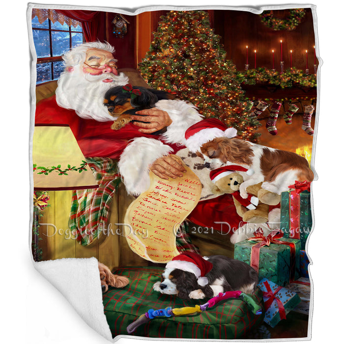 Cavalier King Charles Spaniel Dog and Puppies Sleeping with Santa Blanket