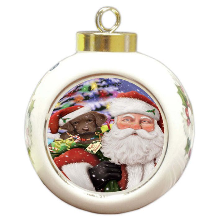 Santa Carrying Chesapeake Bay Retriever Dog and Christmas Presents Round Ball Christmas Ornament RBPOR53976