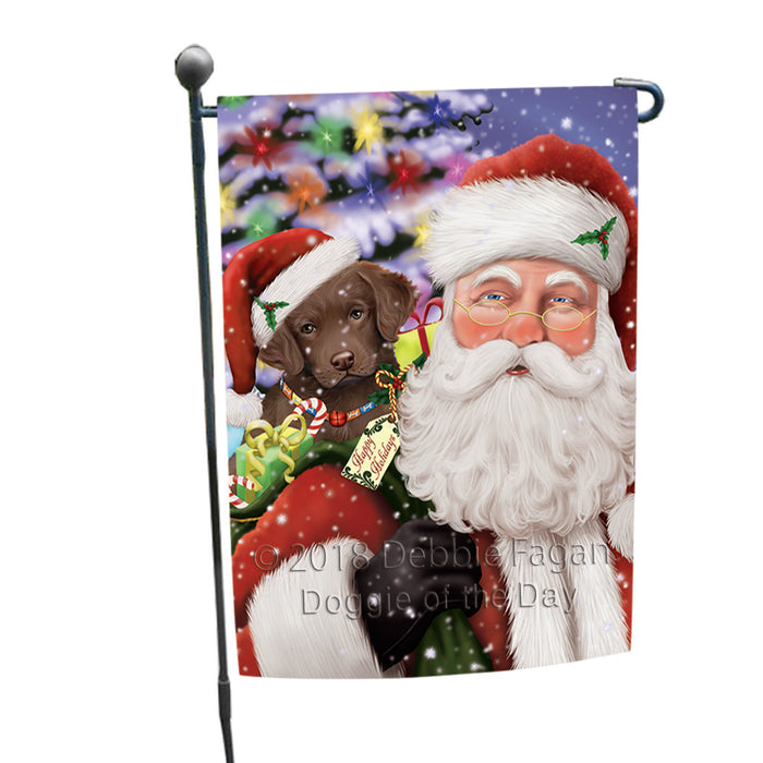 Santa Carrying Chesapeake Bay Retriever Dog and Christmas Presents Garden Flag GFLG54038