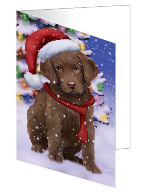 Winterland Wonderland Chesapeake Bay Retriever Dog In Christmas Holiday Scenic Background  Handmade Artwork Assorted Pets Greeting Cards and Note Cards with Envelopes for All Occasions and Holiday Seasons GCD64163