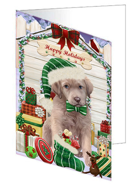 Happy Holidays Christmas Chesapeake Bay Retriever Dog House with Presents Handmade Artwork Assorted Pets Greeting Cards and Note Cards with Envelopes for All Occasions and Holiday Seasons GCD58196