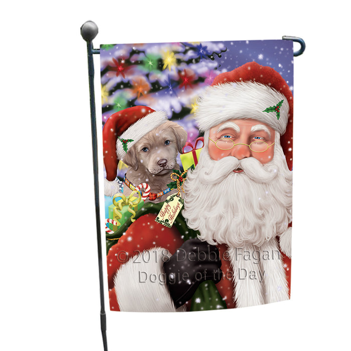 Santa Carrying Chesapeake Bay Retriever Dog and Christmas Presents Garden Flag GFLG54039