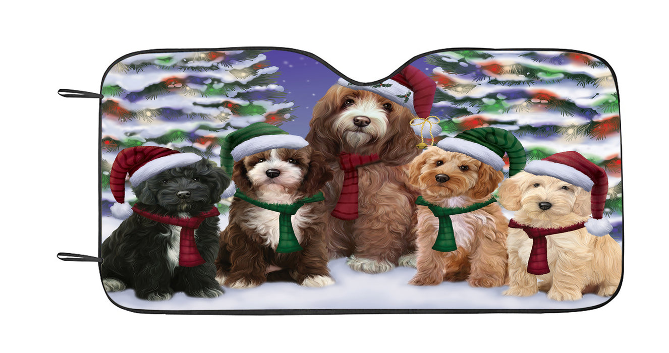 Cockapoo Dogs Christmas Family Portrait in Holiday Scenic Background Car Sun Shade