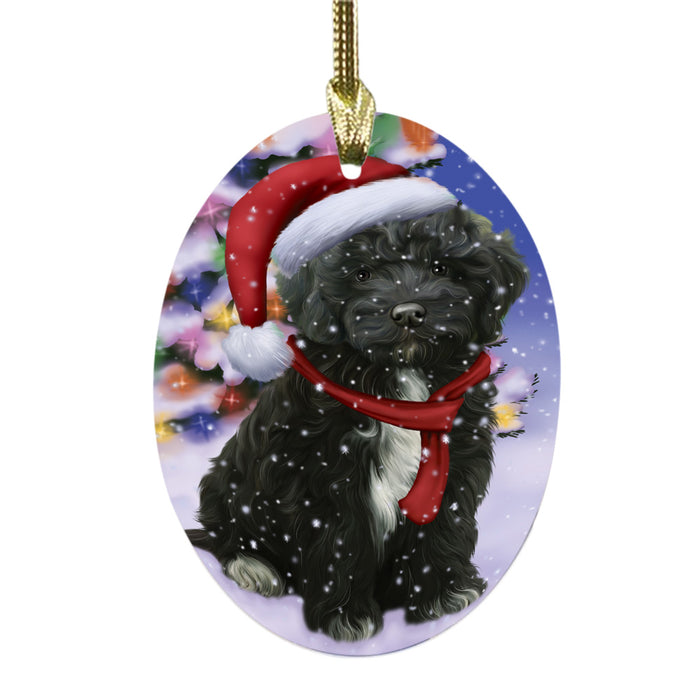 Winterland Wonderland Cockapoo Dog In Christmas Holiday Scenic Background Oval Glass Christmas Ornament OGOR49557