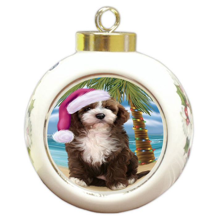 Summertime Happy Holidays Christmas Cockapoo Dog on Tropical Island Beach Round Ball Christmas Ornament RBPOR54549