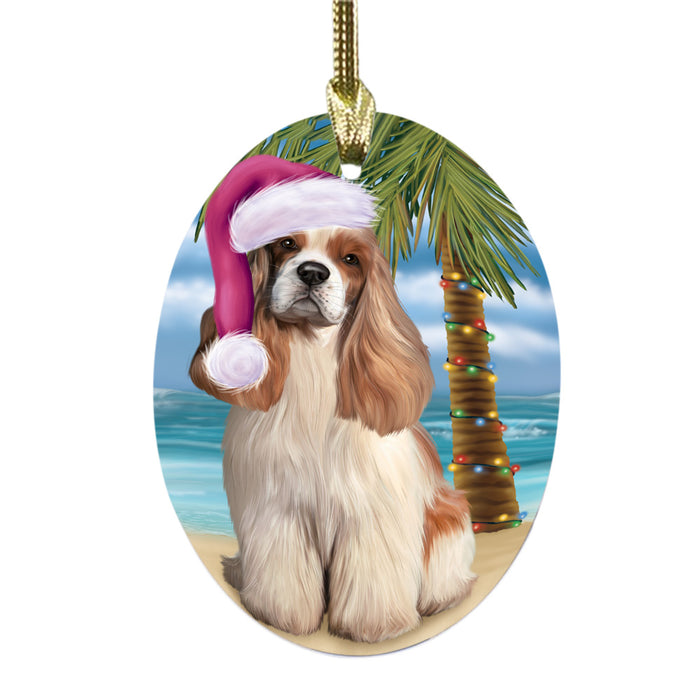 Summertime Happy Holidays Christmas Cocker Spaniel Dog on Tropical Island Beach Oval Glass Christmas Ornament OGOR49364