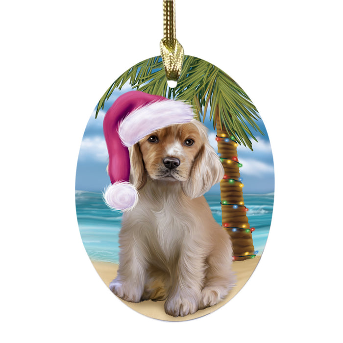 Summertime Happy Holidays Christmas Cocker Spaniel Dog on Tropical Island Beach Oval Glass Christmas Ornament OGOR49366
