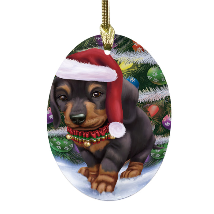 Trotting in the Snow Dachshund Dog Oval Glass Christmas Ornament OGOR49437