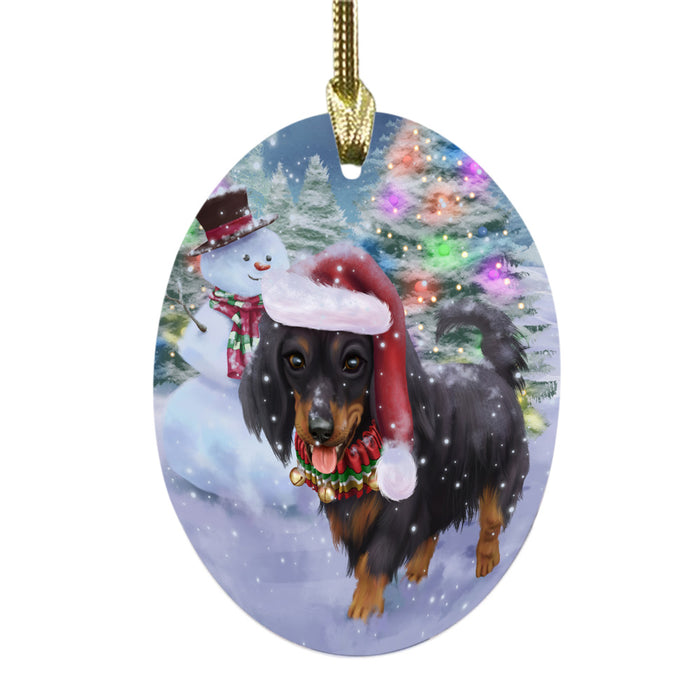 Trotting in the Snow Dachshund Dog Oval Glass Christmas Ornament OGOR49438
