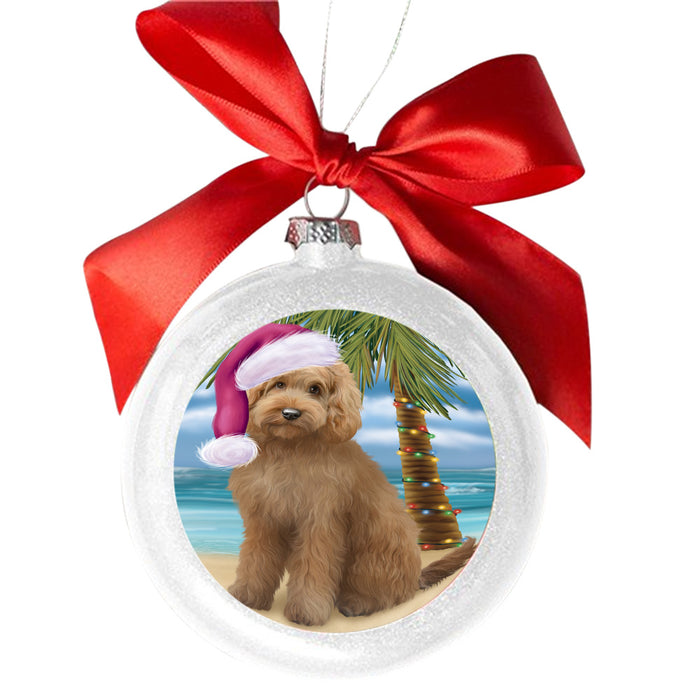 Summertime Happy Holidays Christmas Goldendoodle Dog on Tropical Island Beach White Round Ball Christmas Ornament WBSOR49369
